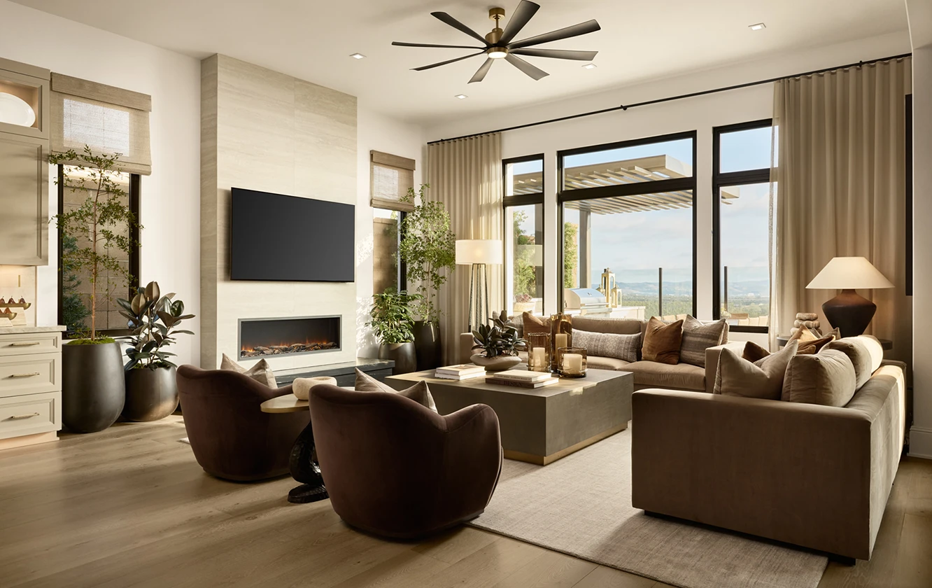 CDC Home design with couches, chairs, television, and ceiling fan